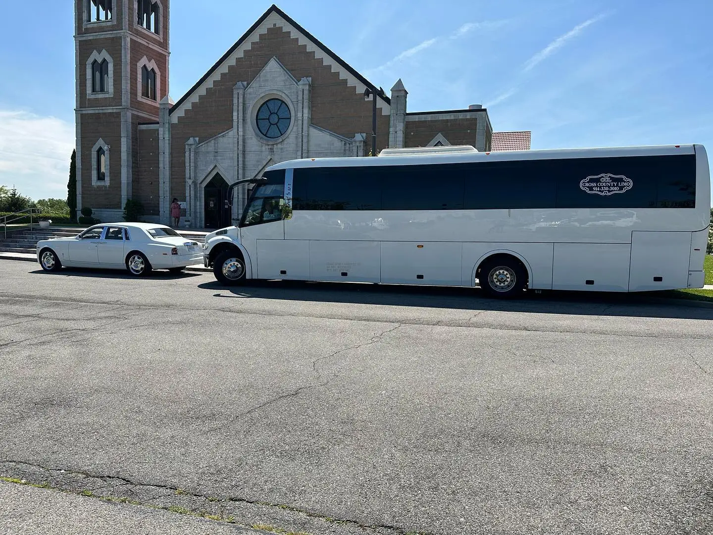 Party bus rental service in Weschester County - white luxury motor coach built on a Freightliner M2 chassis